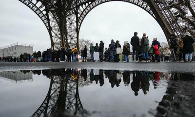 Eiffel Tower reopens to visitors after strike by workers who complained of rust