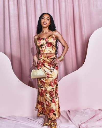 Teala Dunn Stuns In Floral Ensemble With Matching Accessories