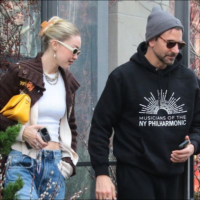 Days After Walking Versace, Gigi Hadid Double-Layers Cardigans for a Cozy Date With Bradley Cooper