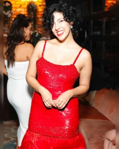 Stephanie Beatriz Shines In Red Dress At Award Function