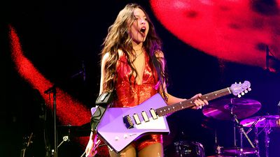“So proud!” Olivia Rodrigo is gigging a custom purple St. Vincent Goldie signature guitar – and the one-off Music Man has a story behind it
