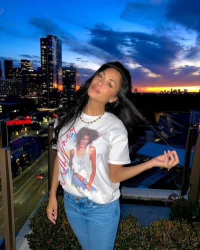 Nicole Scherzinger Nails Casual Chic Look With White Tee And Blue Pants