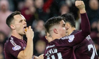 Hearts’ Lawrence Shankland scores penalty, catches pie and takes a bite