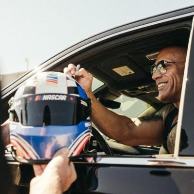 Dwayne Johnson Signs NASCAR Helmet With Signature Style And Generosity