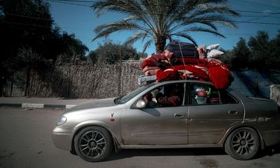 I took my kids to Gaza to see our family. I never thought we’d be trapped for 77 days in a terrifying war