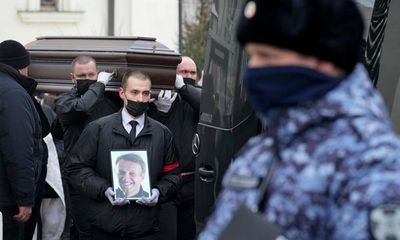 Anything but normal: Navalny laid to rest amid police and protesters