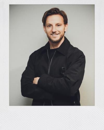 Ivan Rakitic's Effortless Style: Black T-Shirt And Jacket Combo