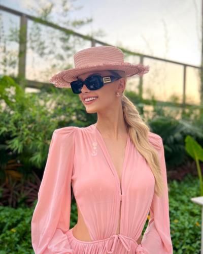 Krystyna Pyszkova Stuns In Pink Dress And Pint Hat