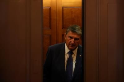 Protester Thrown To Ground At Senator Manchin Event
