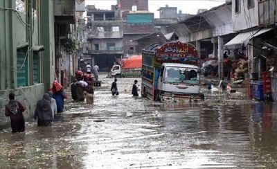 Heavy winter rains in Pakistan kill at least 37 people, collapse buildings and trigger landslides