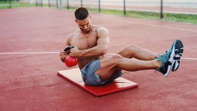 Forget sit-ups — this 5-move kettlebell abs workout torches your obliques and arms in just 10 minutes