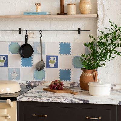 Hand-painted tiles are the ultimate kitsch design feature - here's how to make them feel trendy