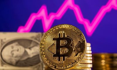 Bitcoin rises above $69,000 in new record high