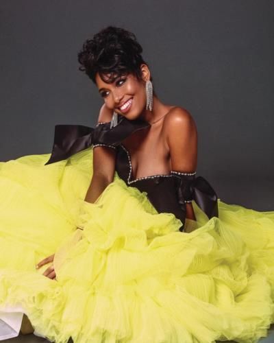 Clémence Botino: Elegance And Charm In Black And Yellow Dress