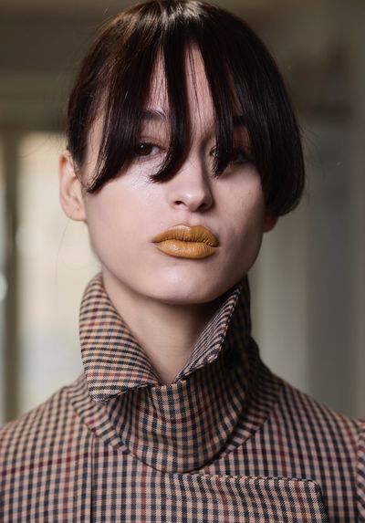 Sculpted Hairstyles and Statement-Making Lipstick Reign Supreme at Paris Fashion Week Fall 2024