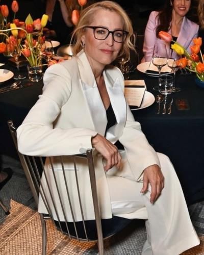 Gillian Anderson Stuns In White Dress With Friends At Event