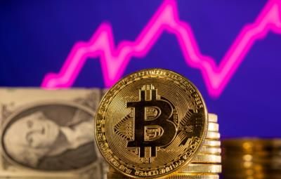 Bitcoin Surges To New Record High