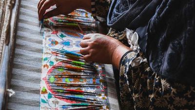 GI tags bring back women artisans to whirring charkhas in Kashmir
