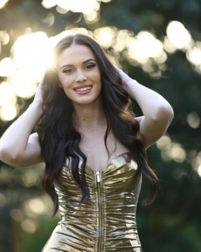 Samantha Misovic Radiates Confidence In Golden Glamour