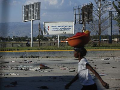 Haiti's prime minister is stranded abroad as gangs threaten 'civil war'