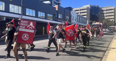 'Kick in the guts': Firefighters march amid wage negotiations