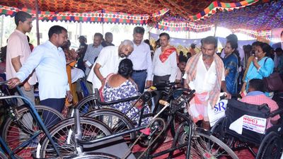 ONGC provides artificial limbs, tricycles to the needy in Vizianagaram