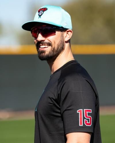 Randal Grichuk's Effortless Style In Classic Black Ensemble