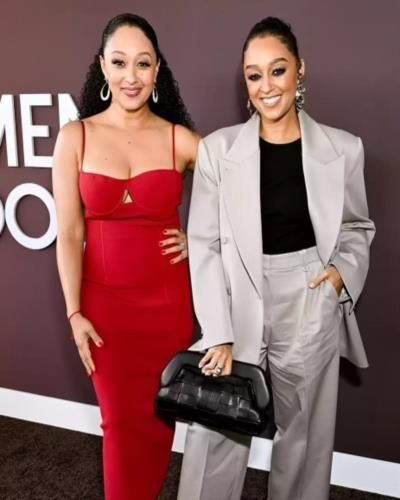 Tamera Mowry-Housley Radiates Elegance And Sisterly Love On Red Carpet
