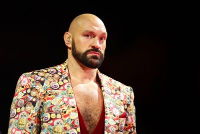 Tyson Fury wore a suit with a title belt pattern at Ngannou-Joshua to remind everyone he’s the champ