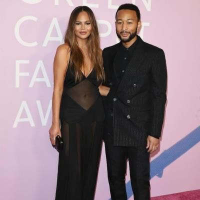 John Legend And Wife Shine In Coordinated Red Carpet Attire