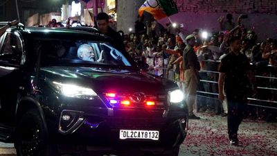 PM Modi arrives in Varanasi, takes out roadshow