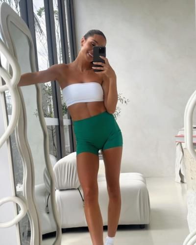Kayla Itsines Shows Off Strong Mirror Selfie Game In Workout Gear