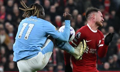 Doku involved at both ends as Liverpool and Manchester City share spoils