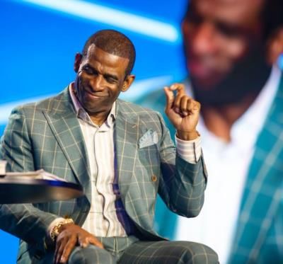 Deion Sanders: A Portrait Of Effortless Style And Confidence