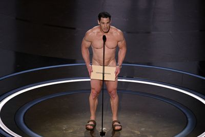 John Cena showed up naked to the Oscars, and we can’t un-Cena it