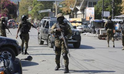 Haiti crisis: gangs attack police stations as Caribbean leaders call for emergency meeting