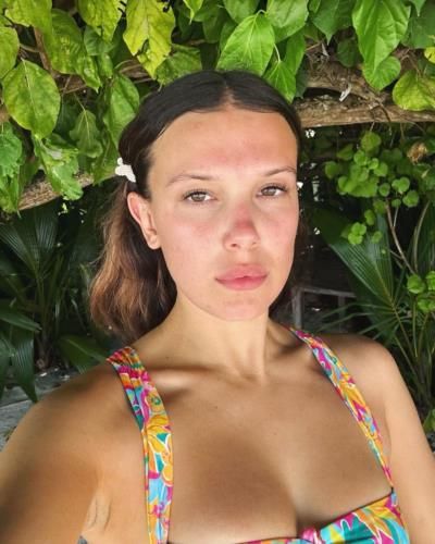 Joyful Moments: Millie Bobby Brown And Her Furry Friend