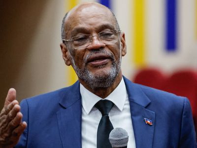 Haiti's prime minister says he'll resign once a transitional council is created