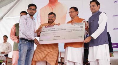Uttarakhand: CM Dhami distribute cheques to beneficiaries under State Livestock Mission Scheme