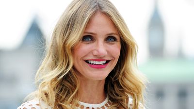 Cameron Diaz's unpainted kitchen cabinets and drawers are the dream contrast to her luxury marble worktop