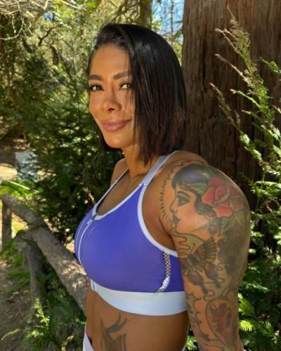 Massy Arias Showcases Powerful Tattoos On Her Strong Arms