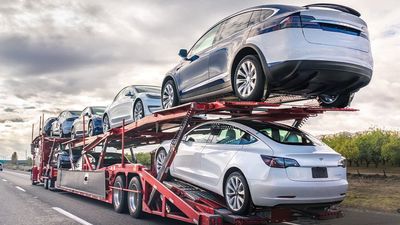 Tesla Stock Downgraded With Vehicle Deliveries To Disappoint. This Bull Is Still Optimistic.
