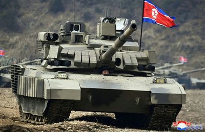 N. Korean Leader Unveils And 'Drives' New Battle Tank