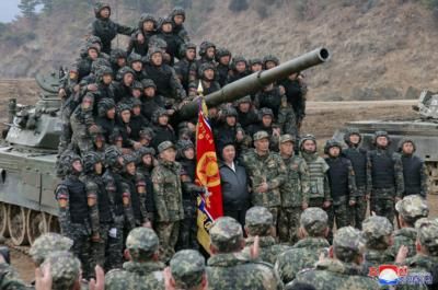 North Korea's Kim Showcases New Tank In Mock Battle