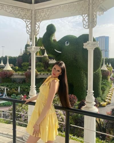 Radiant Yellow: Kristiyana Yordanova Shines In Sun-Inspired Dress