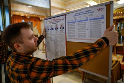‘Do I vote? Hell no’: Russia heads to predictable presidential election