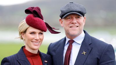 Zara Tindall goes classic in pinstripe trouser suit as she shares public kiss with Mike Tindall at Cheltenham