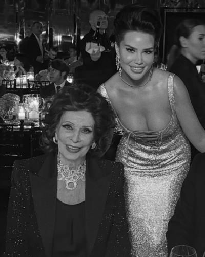 Captivating Elegance: Endi Demneri And Sophia Loren's Timeless Snapshot