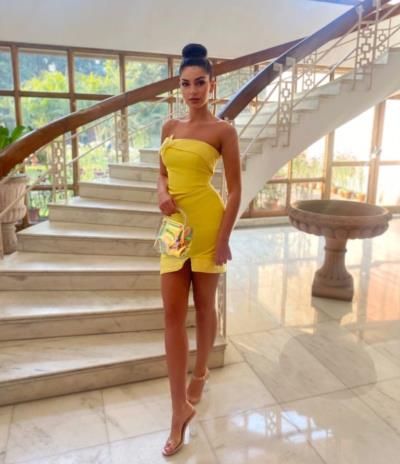 Anja Radic Radiates Confidence In Vibrant Yellow Mini Outfit