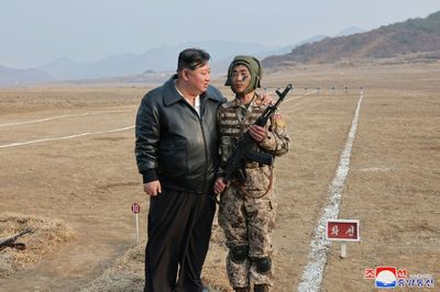 North Korean Leader Kim Oversees Paratroop Drills